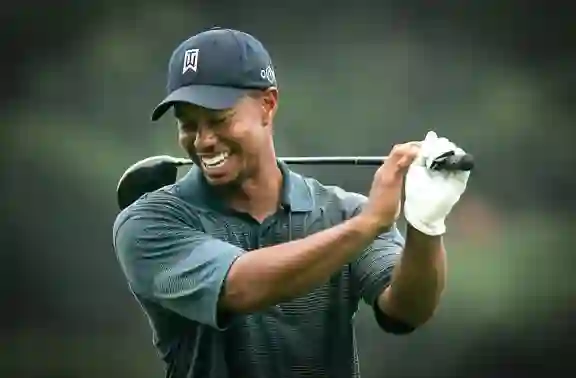 Tiger Woods displaying confident body language during championship golf tournament press conference by Som Dutt from Embrace Inner chaos